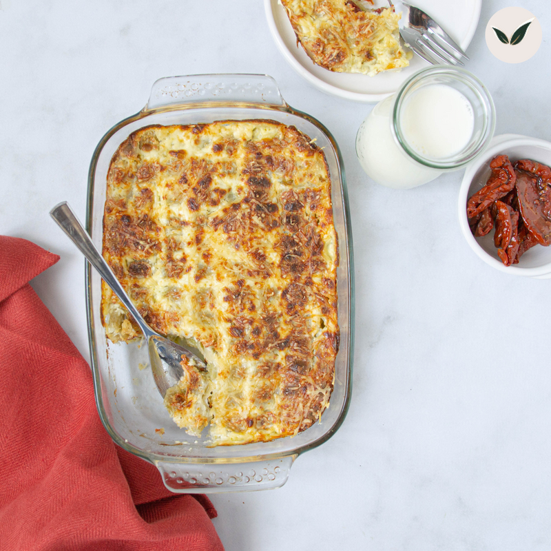 Gratin de ravioles du Dauphiné aux tomates séchées et salade d'accompagnement